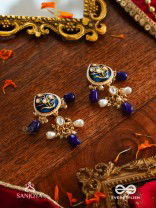 NILACHANDRIKA- MOONLIGHT OF THE BLUE SKY- KUNDAN EARRINGS WITH DEEP BLUE ENAMEL WORK WITH GOLDEN DETAILS, PEARLS, AND DAZZLING GEMS