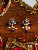 NILACHANDRIKA- MOONLIGHT OF THE BLUE SKY- KUNDAN EARRINGS WITH DEEP BLUE ENAMEL WORK WITH GOLDEN DETAILS, PEARLS, AND DAZZLING GEMS