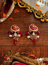 ARUNAMUKHI- FACE OF THE RED SUN- GLORIOUS KUNDAN EARRINGS WITH RED ENAMEL DETAILS AND PEARL EMBELLISHMENTS 