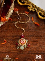 SHONAPRABHA- RADIANCE OF GOLD AND RED- HANDCRAFTED KUNDANMAANGTIKA  WITH GOLDEN MOONS AND RED BEADS