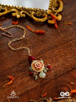 SHONAPRABHA- RADIANCE OF GOLD AND RED- HANDCRAFTED KUNDANMAANGTIKA  WITH GOLDEN MOONS AND RED BEADS