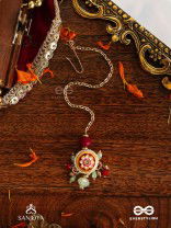 SHONAPRABHA- RADIANCE OF GOLD AND RED- HANDCRAFTED KUNDANMAANGTIKA  WITH GOLDEN MOONS AND RED BEADS