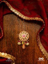 HARITRINA - GREEN AND PINK BEAUTY - ORNATE KUNDAN MAANGTIKA WITH FLORAL MOTIFS AND SPARKLING DROPS