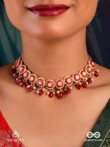 RUDRANJALI - SACRED RED OFFERING- TRADITIONAL RED ENAMELLED POLKI CHOKER WITH LUSTROUS BEADS AND PEARLS