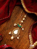 RATNODYA - RISING GEM - DAZZLING KUNDAN MAANGTIKA WITH PEARLS AND ROYAL GREEN AND GOLD ACCENTS