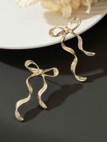 WISP KNOT- SOFT AND CURVY BOW INSPIRED EARRINGS
