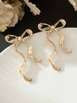 WISP KNOT- SOFT AND CURVY BOW INSPIRED EARRINGS