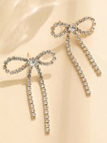 GOLDEN GLIMMER BOW -  GRACEFUL AND SPARKLING BOW EARRINGS