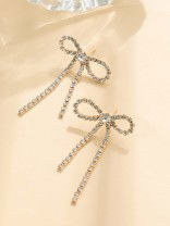 GOLDEN GLIMMER BOW -  GRACEFUL AND SPARKLING BOW EARRINGS