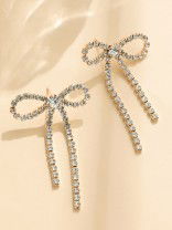 GOLDEN GLIMMER BOW -  GRACEFUL AND SPARKLING BOW EARRINGS