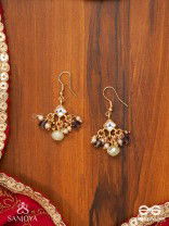 HARSHITA - THE JOYFUL ONE- DELICATE PEARL EARRINGS WITH MINI KUNDAN BLOOMS AND GREEN GEM DROPLETS