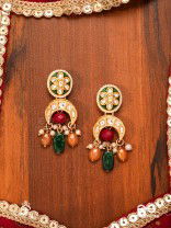 UTKALINI - EXQUISITELY DESIGNED- ENAMEL KUNDAN EARRINGS WITH LAYERED PEARL FRINGES AND VIBRANT BEADS