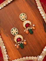 UTKALINI - EXQUISITELY DESIGNED- ENAMEL KUNDAN EARRINGS WITH LAYERED PEARL FRINGES AND VIBRANT BEADS