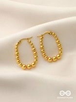 SUNBURST HOOPS – DELICATE DROP-SHAPED STAINLESS STEEL EARRINGS