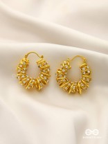 LUSTROUS SWIRLS-  INTRICATE TWISTED GOLD EARRINGS WITH SHIMMERING STONE