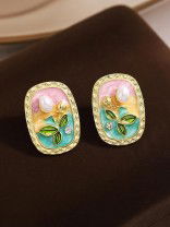 FLORAL MUSE- STATEMENT EARRINGS WITH EMBOSSED FLOWERS AND PEARLS