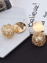 Mirror reflection- pearl in a cage of gold earrings
