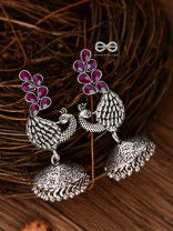 The Dancing Peacocks Engraved Jhumkis (Ruby Red) - Embellished Oxidised Collection