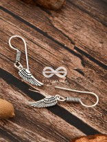 The Angel Wing Danglers - Tiny Trinket Earrings