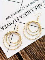 The Shimmery Circles - Golden Elegant Earrings