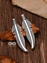 The Little Feather Studs - Tiny Trinket Earrings