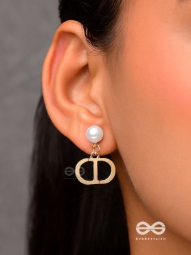 Starlit orb- dangling pearl earrings with golden spheres 