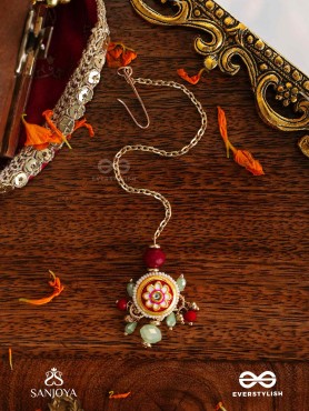 SHONAPRABHA- RADIANCE OF GOLD AND RED- HANDCRAFTED KUNDANMAANGTIKA  WITH GOLDEN MOONS AND RED BEADS