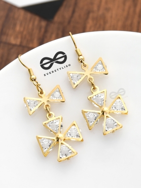 A Shimmery Statement Danglers - The Golden Charm Collection