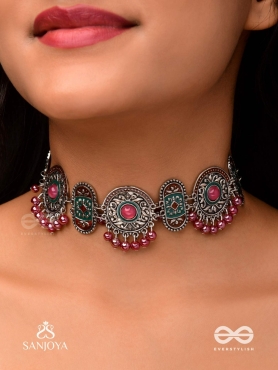 RAKTASHREE– RED ELEGANCE : OXIDIZED CHOKER WITH INTRICATE WORK AND BOLD RED ACCENTS, PERFECT FOR A TRADITIONAL LOOK