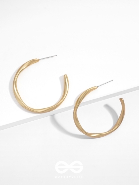 The Subtle Affirmation Golden Twists Hoop Earrings