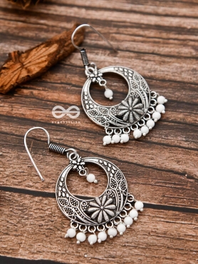 The White Elegance Traditional Motif Earrings