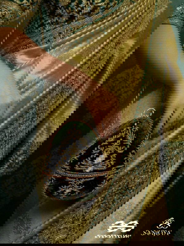 SABREEN - OVAL DEEP OLIVE GREEN VELVET HANDLE CLUTCH WITH RICH HAND DETAILING AND GOLDEN METAL FRAME