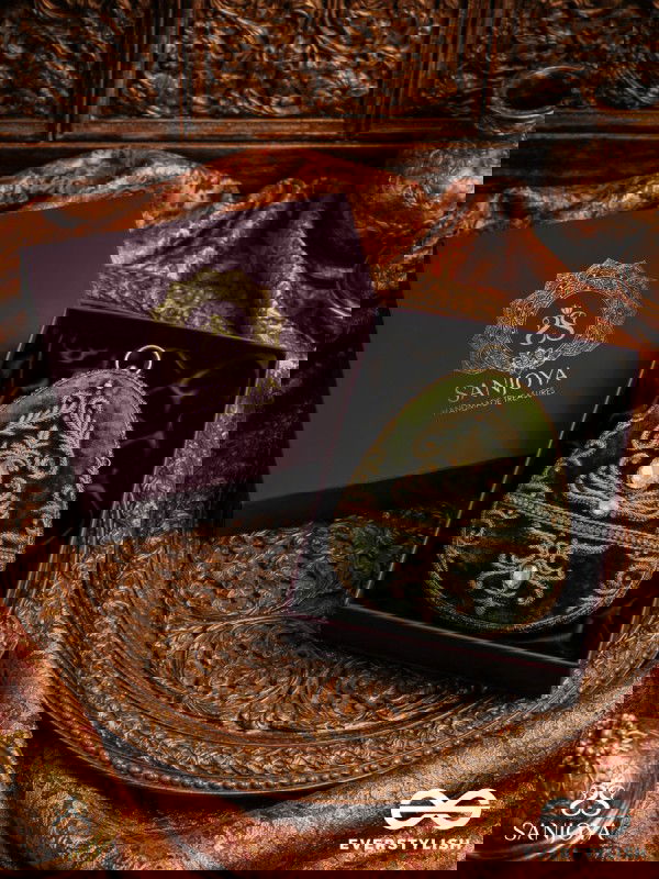 SABREEN - OVAL DEEP OLIVE GREEN VELVET HANDLE CLUTCH WITH RICH HAND DETAILING AND GOLDEN METAL FRAME