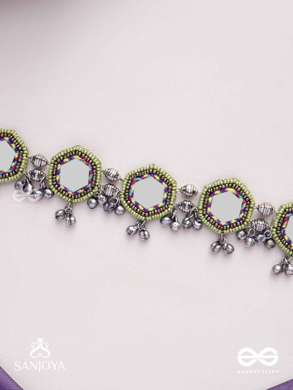 Chāyāmālā-Reflective choker- oxidized choker featuring intricate beadwork, mirrors, ghungroo (small bells), and thread details