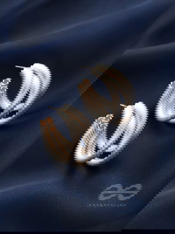 THE ELEGANT TURNS - MATTE FINISHED SILVER HOOPS