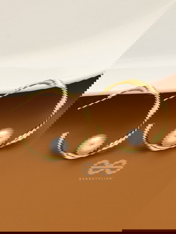 The Alluring Twists - Golden Pearl Hoops