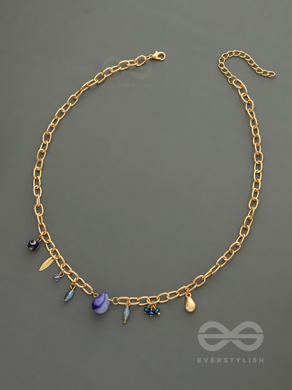 Fragments of the Sky- Blue Crystals Studded Golden Necklace