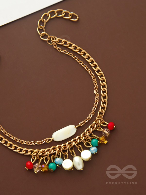 The Divine Galaxy- Pearls and Beads Studded Golden Bracelet