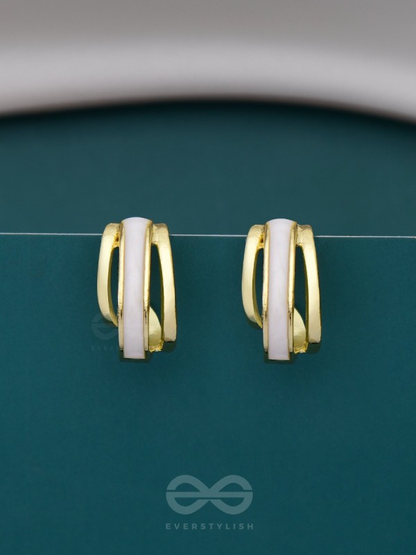A CLASSY DAME - WHITE ENAMELLED GOLDEN STUDS
