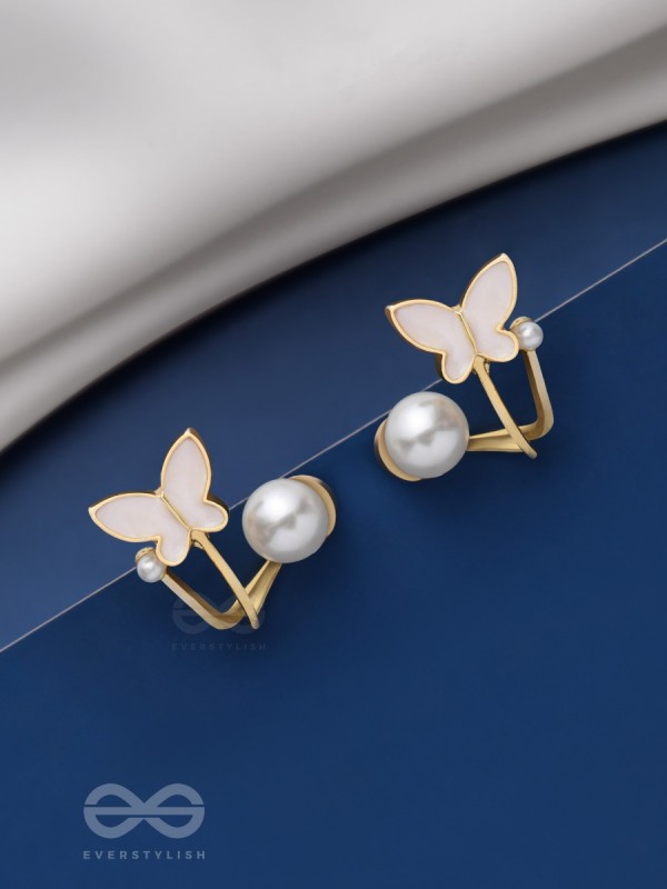 A WINGED WONDER - GOLDEN AND WHITE EAR JACKETS