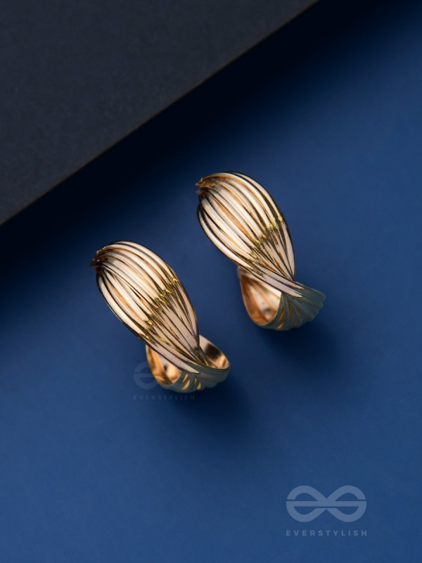 LEVELING IT UP - STATEMENT GOLDEN HOOPS