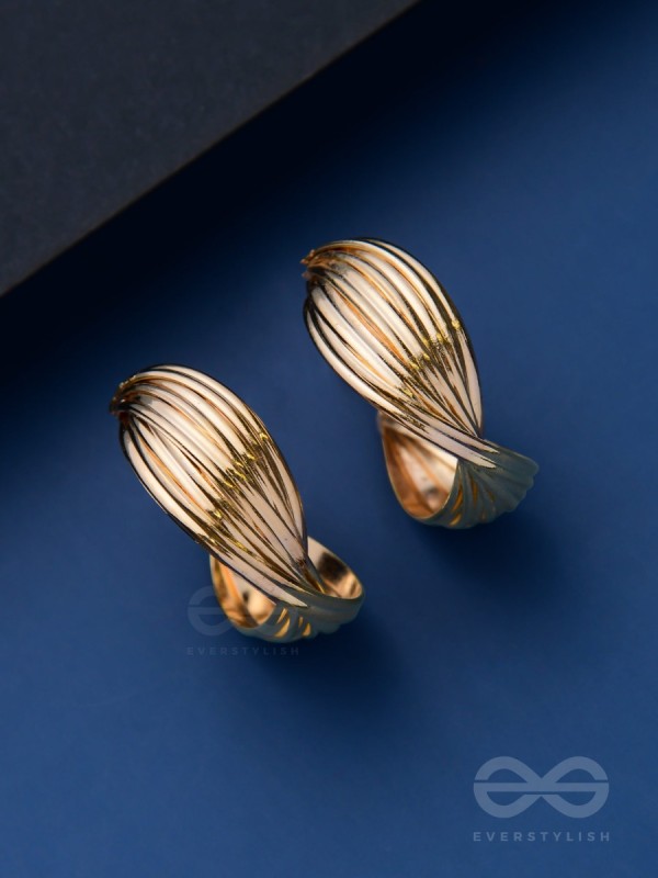 LEVELING IT UP - STATEMENT GOLDEN HOOPS