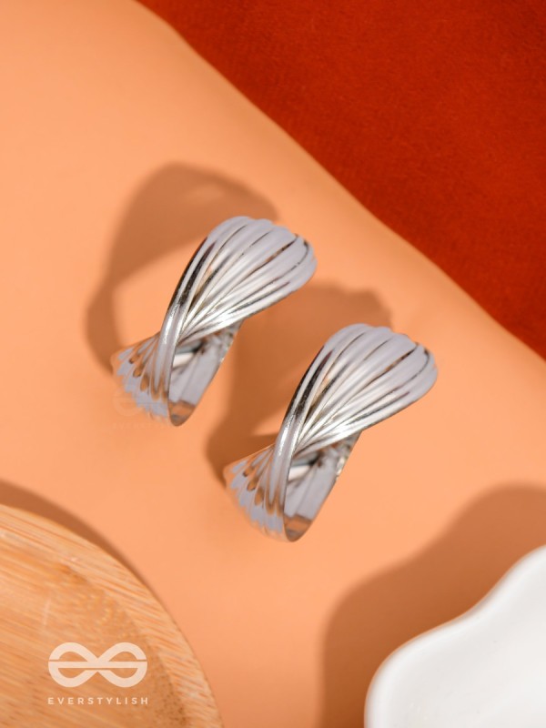 LEVELING IT UP - STATEMENT SILVER HOOPS