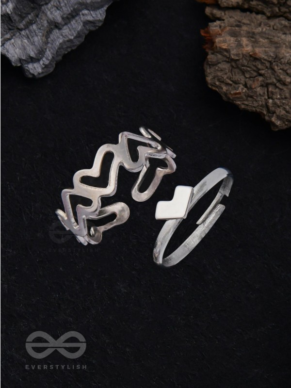 LOVE PUZZLE - SET OF 2 SILVER RINGS