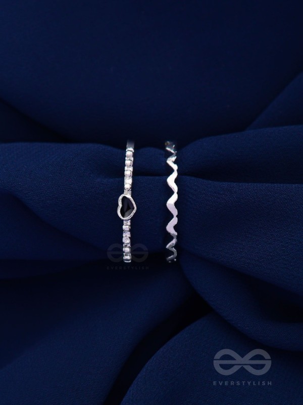 LIFE IN A ZIG-ZAG- SET OF 2 ADJUSTABLE SILVER RINGS