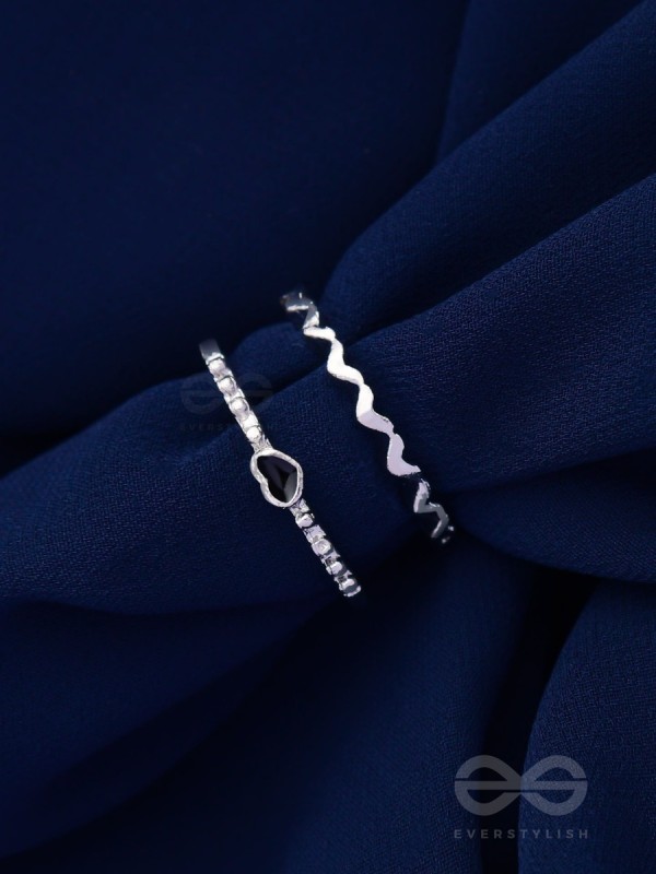 LIFE IN A ZIG-ZAG- SET OF 2 ADJUSTABLE SILVER RINGS