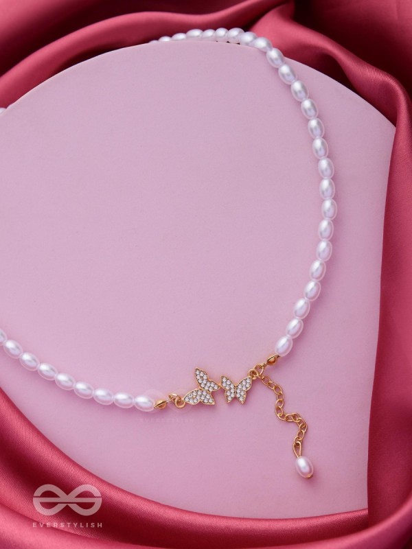 TWO TINY AVIATORS - GOLDEN PEARL NECKPIECE