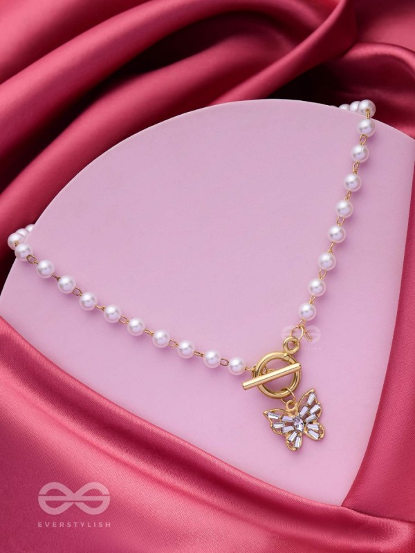 A FLYING MIRACLE - GOLDEN PEARL NECKPIECE