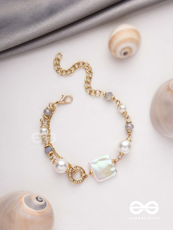 CLASSIC IVORY ALLURE - GOLDEN EMBELLISHED BRACELET WITH ANTI TARNISH COATING 