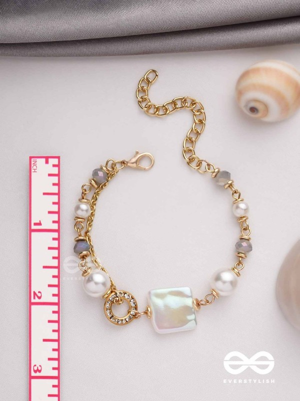 CLASSIC IVORY ALLURE - GOLDEN EMBELLISHED BRACELET WITH ANTI TARNISH COATING 